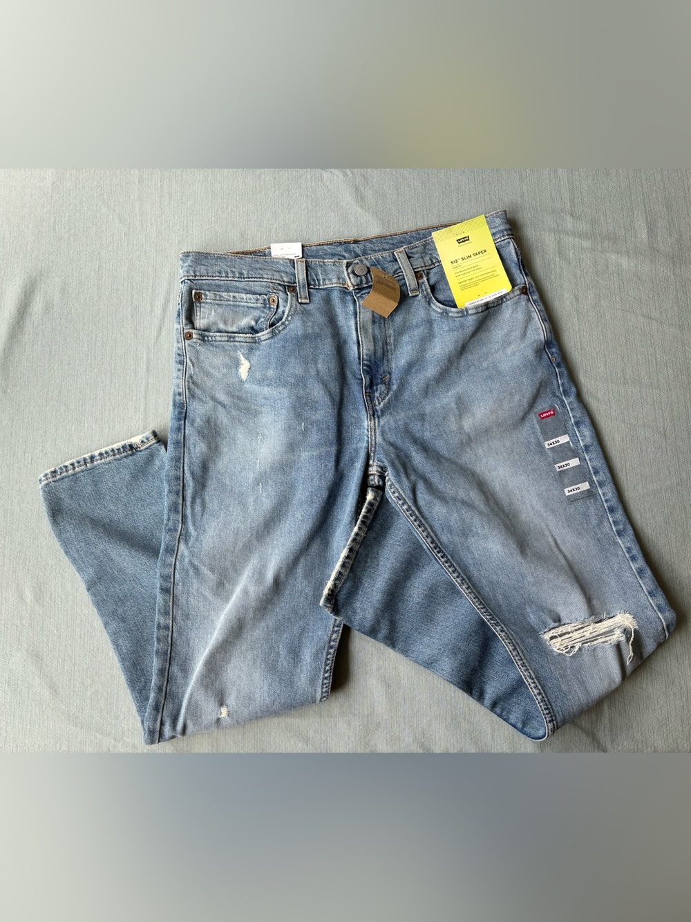 Levi's Light Blue Distressed Ankle Jeans